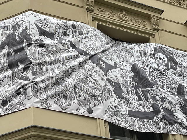 big satirical cartoon of city life on a house wall